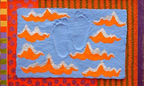 colorful artwork with orange waves and footprints on a blue background